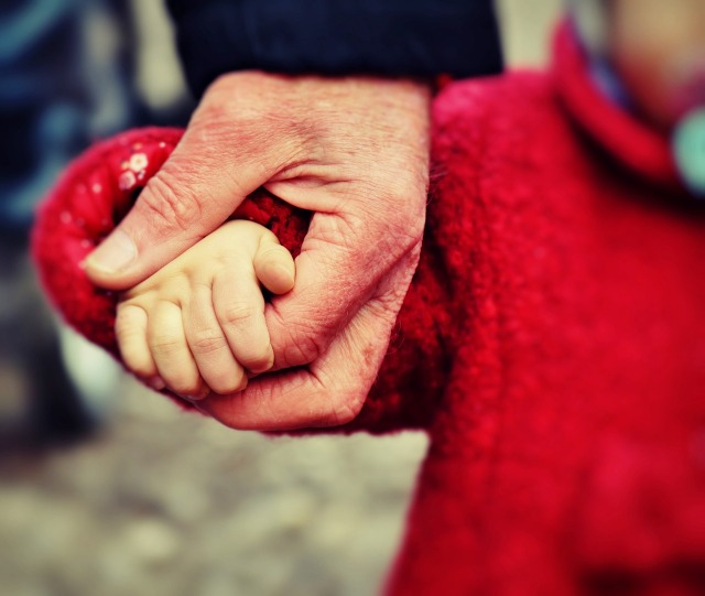 man_holding_child_hand
